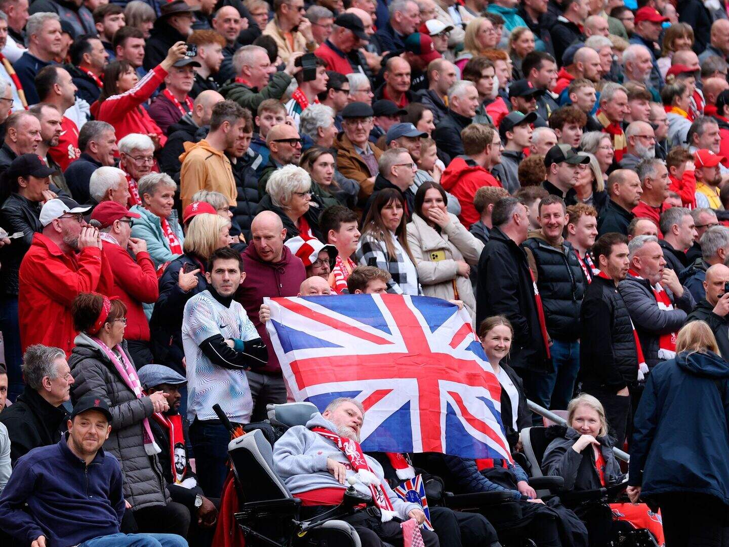 Liverpool fans make their feelings known as British anthem is played ...