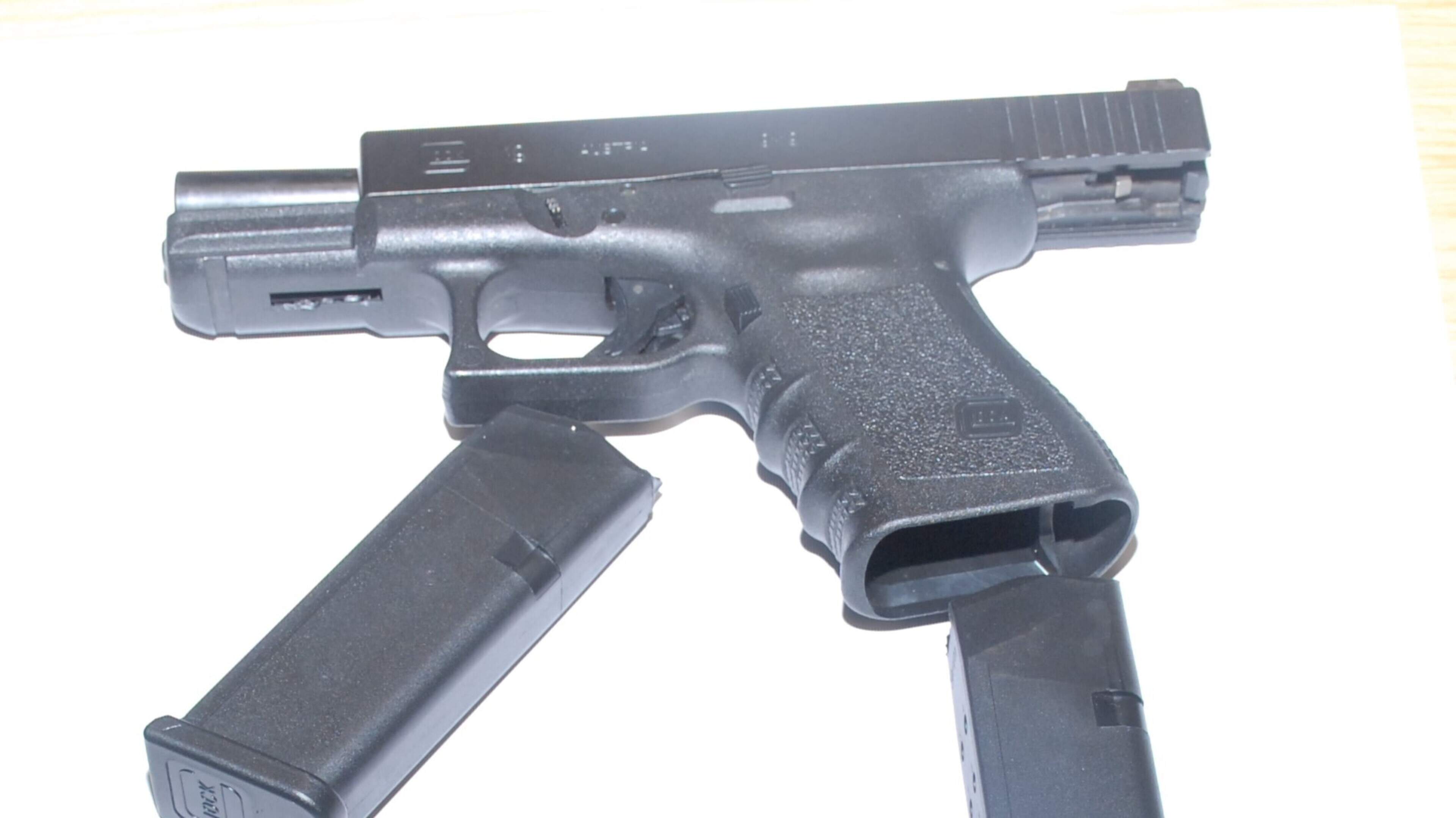 Man (30s) and woman (20s) arrested as gardai seize semi-automatic pistols, ammo and replica grenade