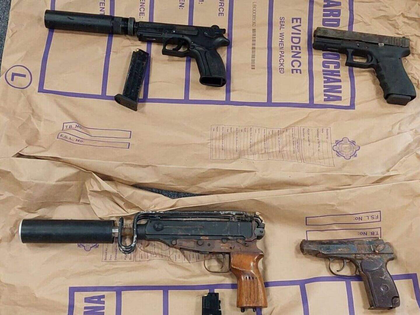 Two charged after four guns, silencer and heroin worth €70k seized in ...