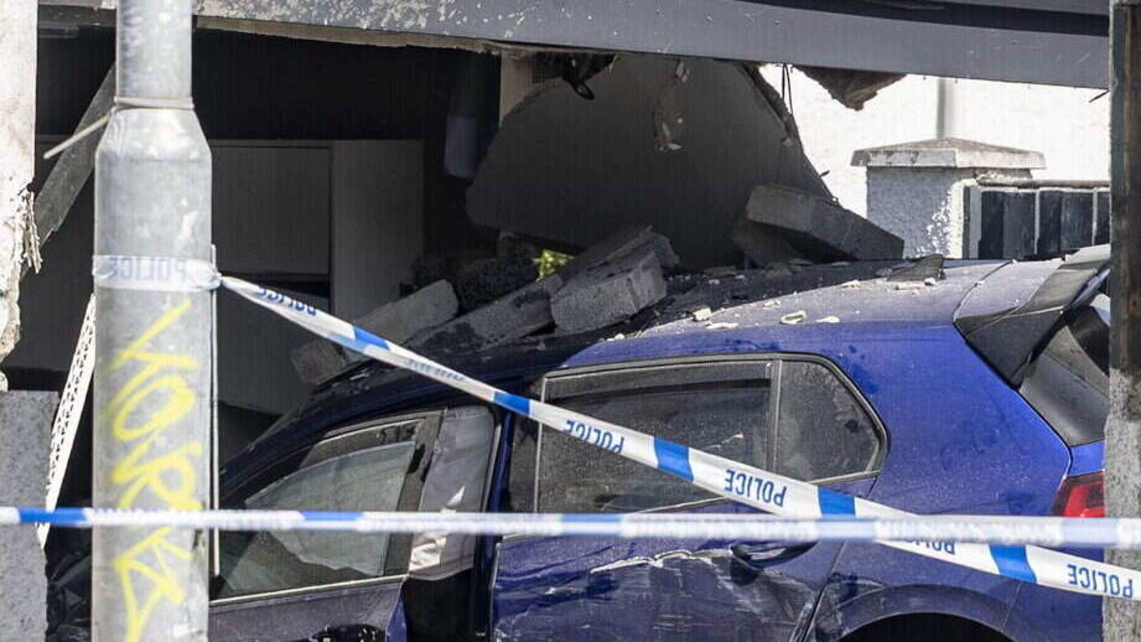 Man (21) and woman (33) arrested after car ploughs into family home in Belfast