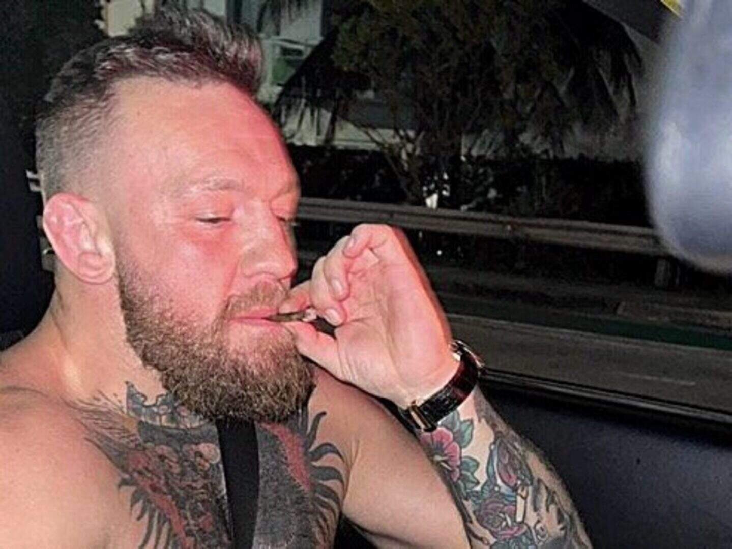 ufc fighter smoking cigarettes Conor McGregor smokes small cigarette and brags he's the richest fighter in  UFC