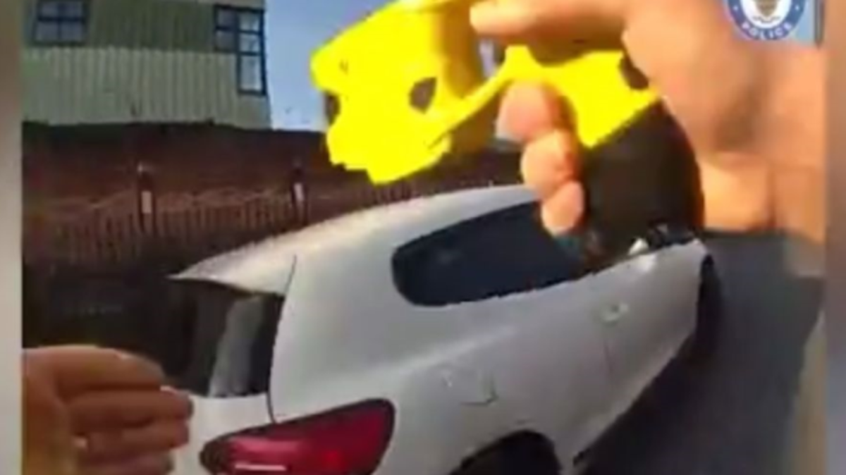 Video: Chaos as banned driver crashes into three police cars while ...