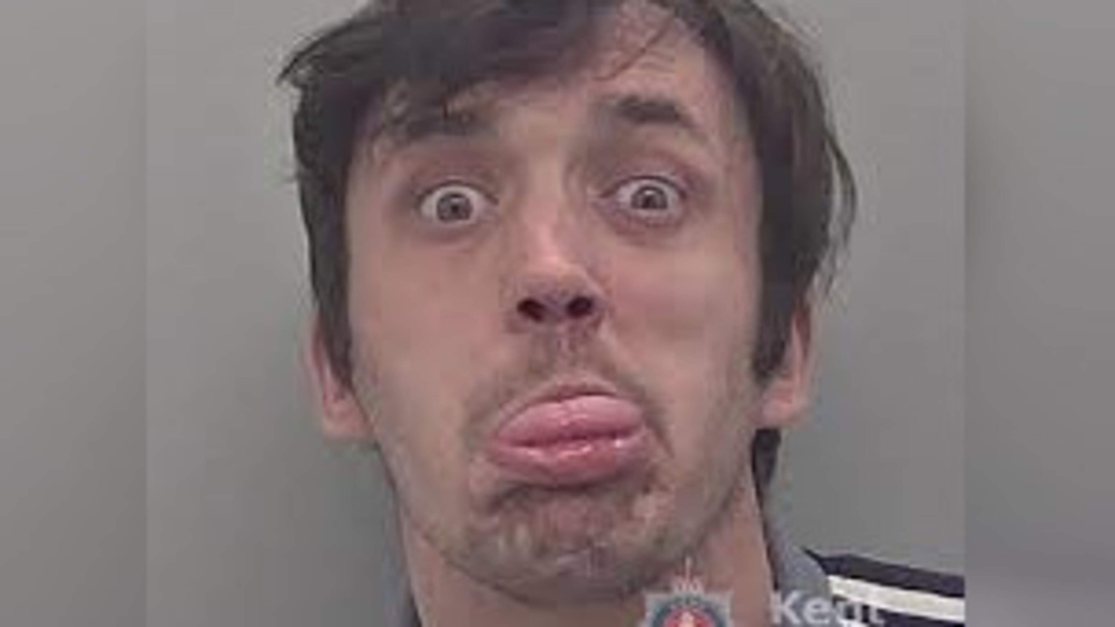 Thug who stuck his tongue out in mugshot jailed for strangling woman