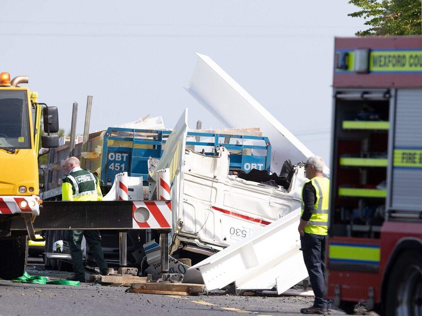 Truck driver airlifted to hospital after being trapped for over two ...