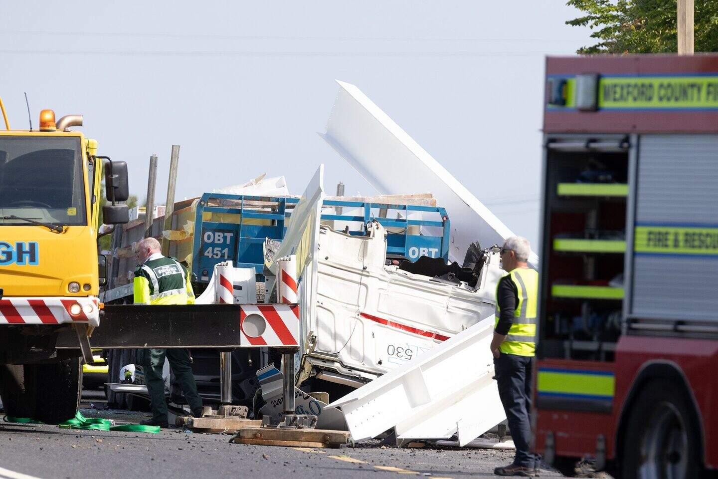 Truck driver airlifted to hospital after being trapped for over two ...