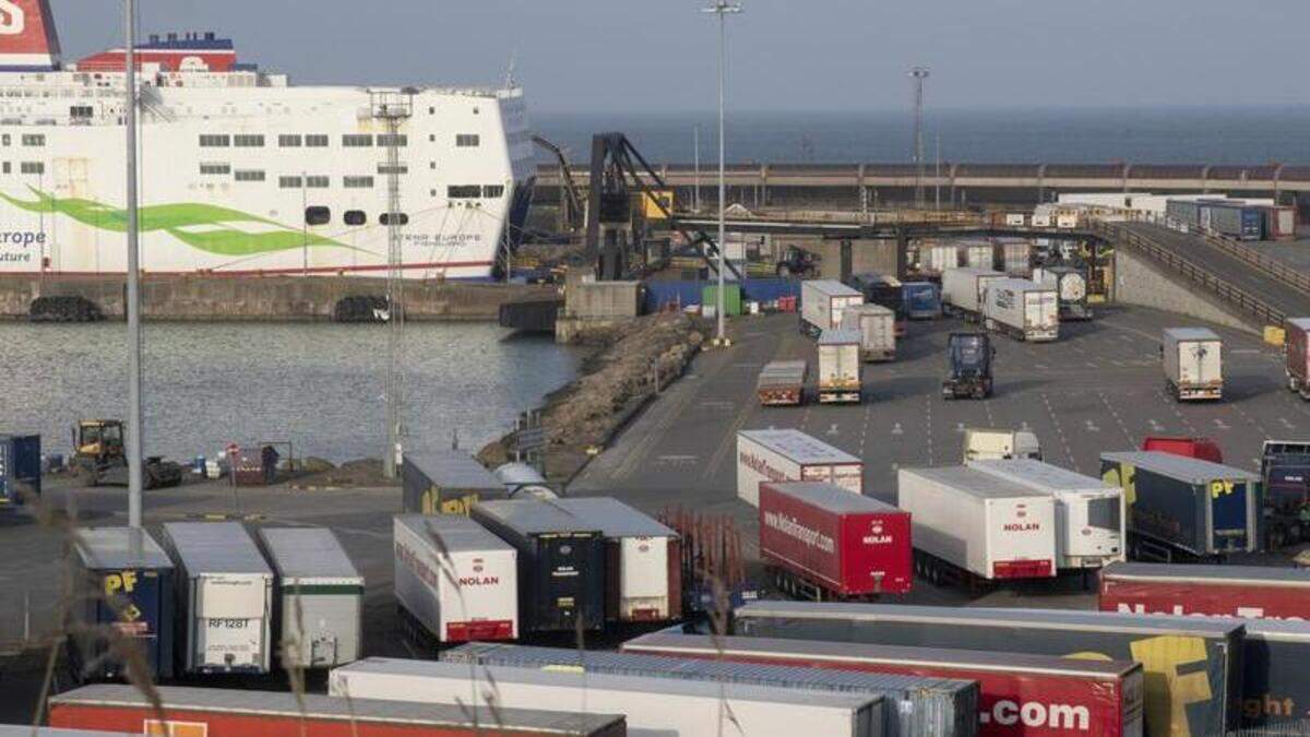 Truck driver arrested after two illegal immigrants were found hiding in ...