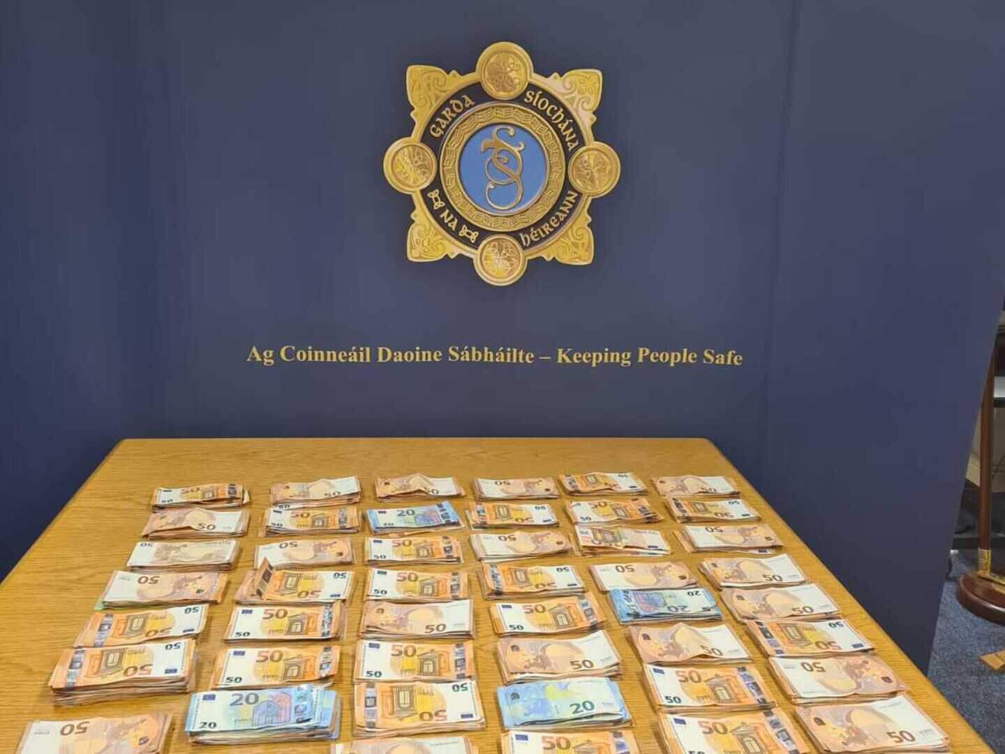 Man and woman arrested on suspicion of money laundering after €50k ...