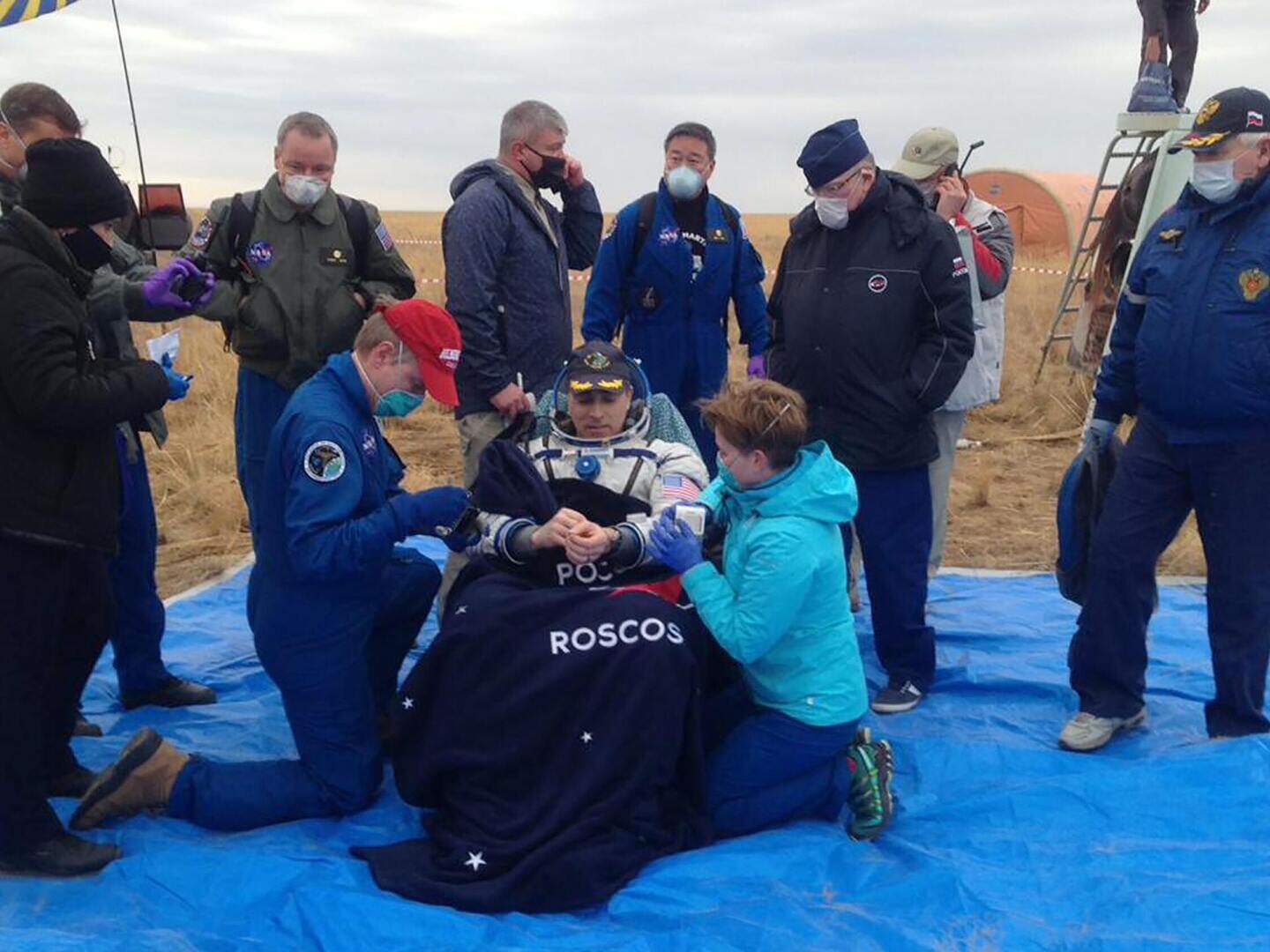 Trio of space travellers return safely to Earth after six-month mission ...