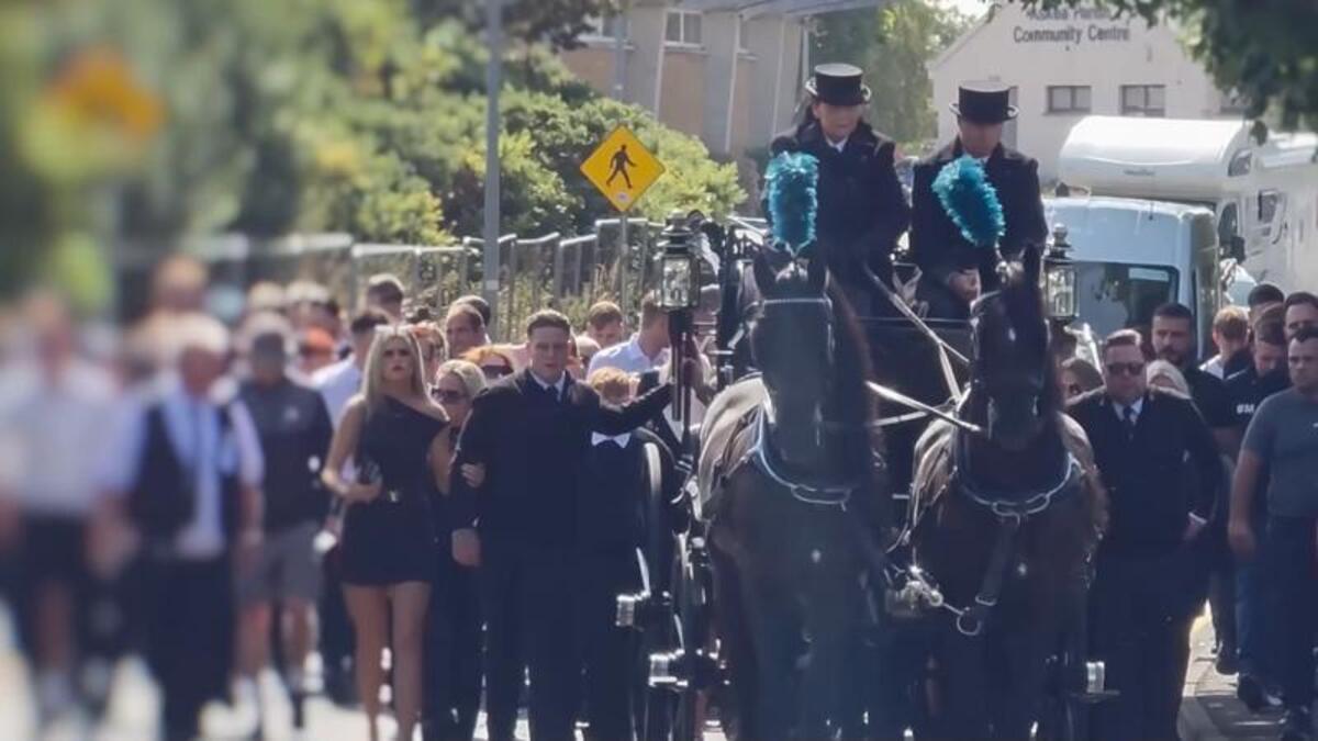 Lone piper leads horse-drawn coffin of M9 crash teen as large garda presence shadows town