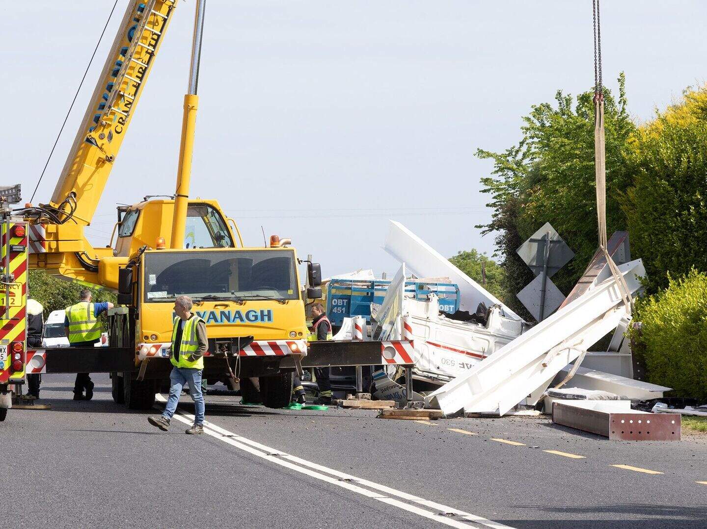 Truck driver airlifted to hospital after being trapped for over two ...