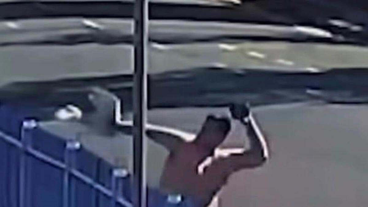 Topless fool fails THREE times to launch drugs over wall into prison