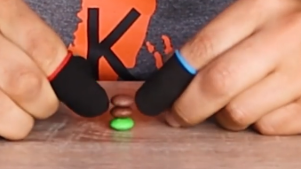 Man beats Guinness World Record for building tallest stack of M&Ms ...