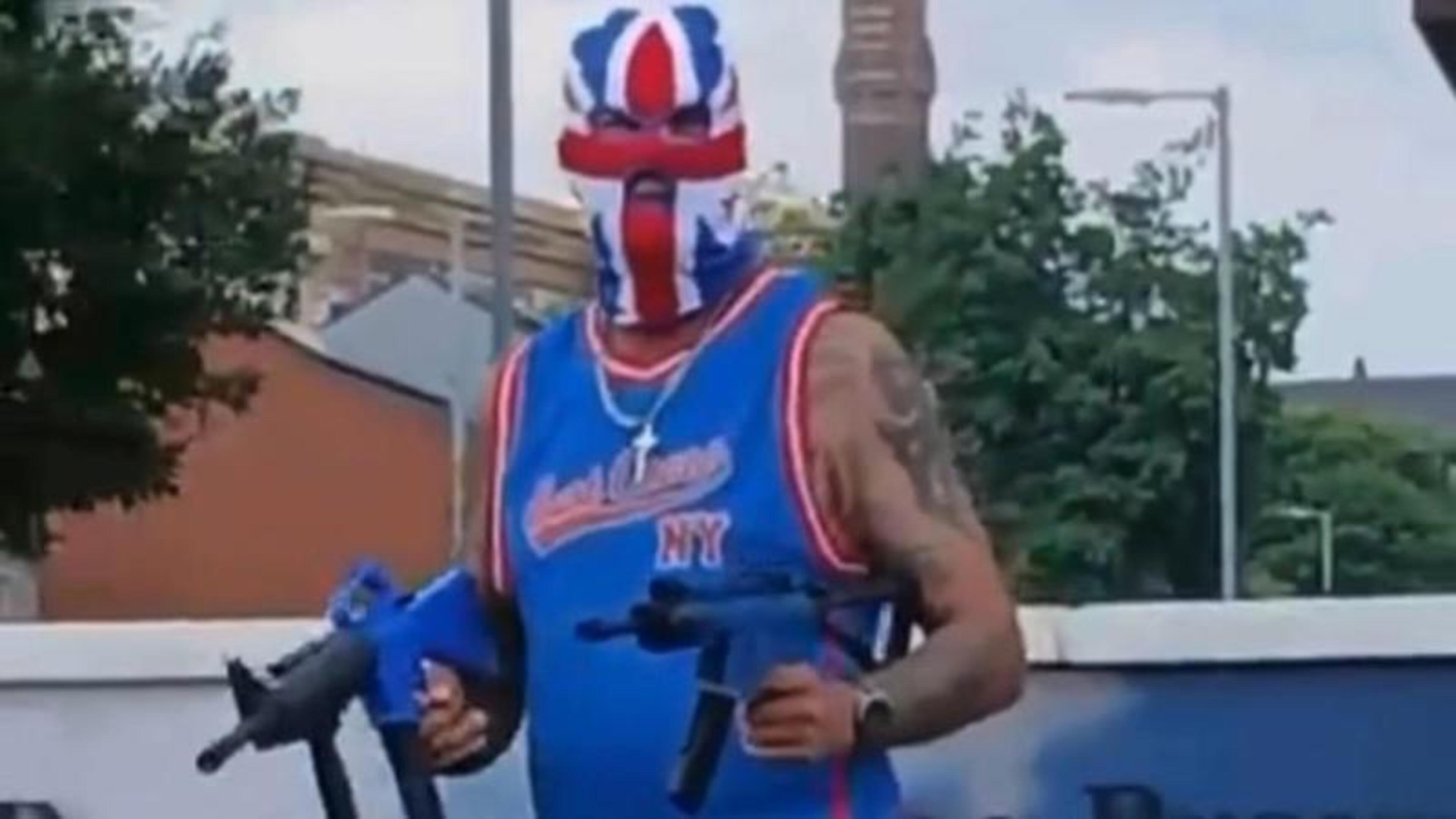 Police probe video showing man in Union Jack balaclava and with imitation gun near killer’s mural