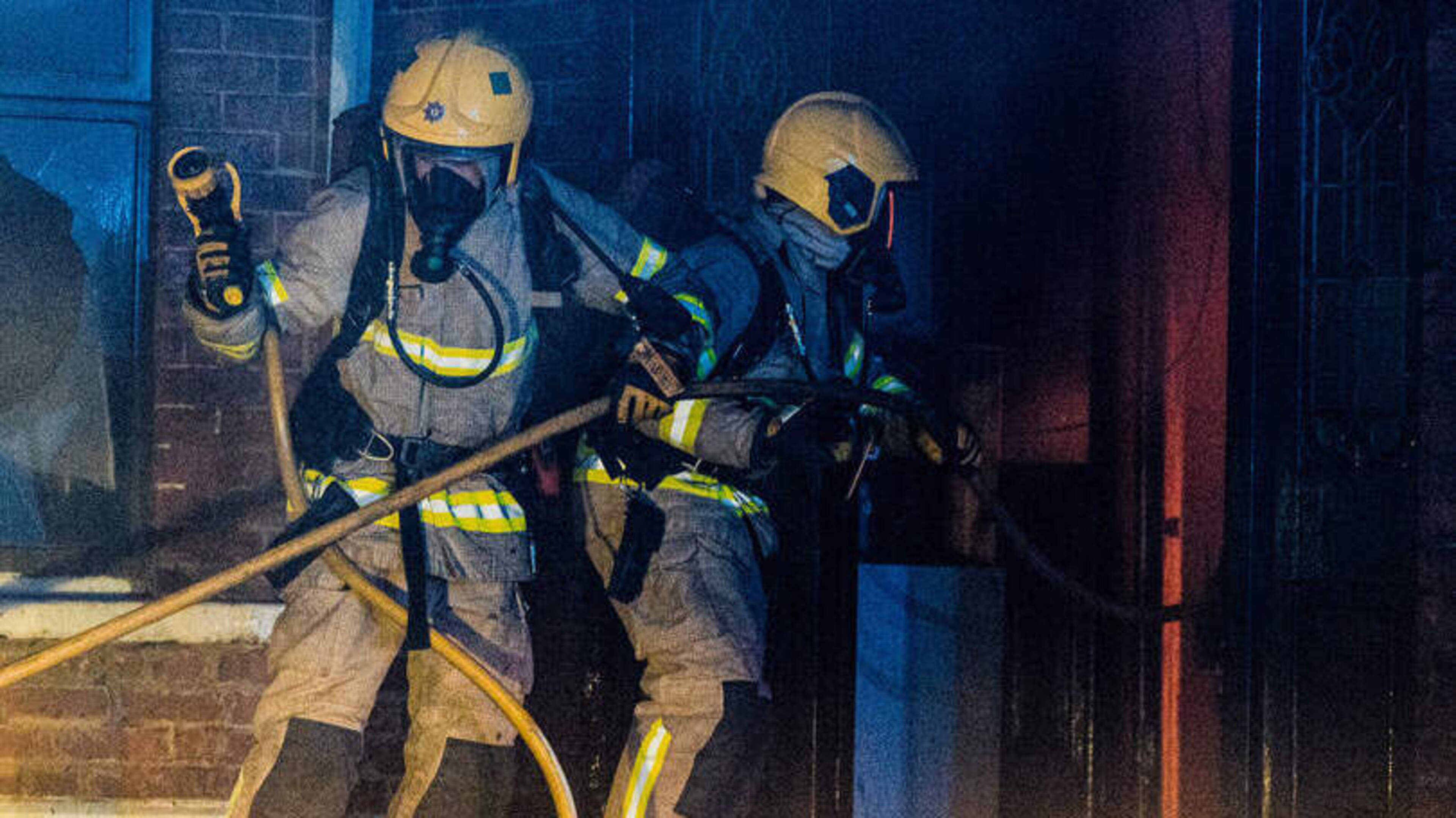 Seven people rescued by firefighters after arson attack at apartment block