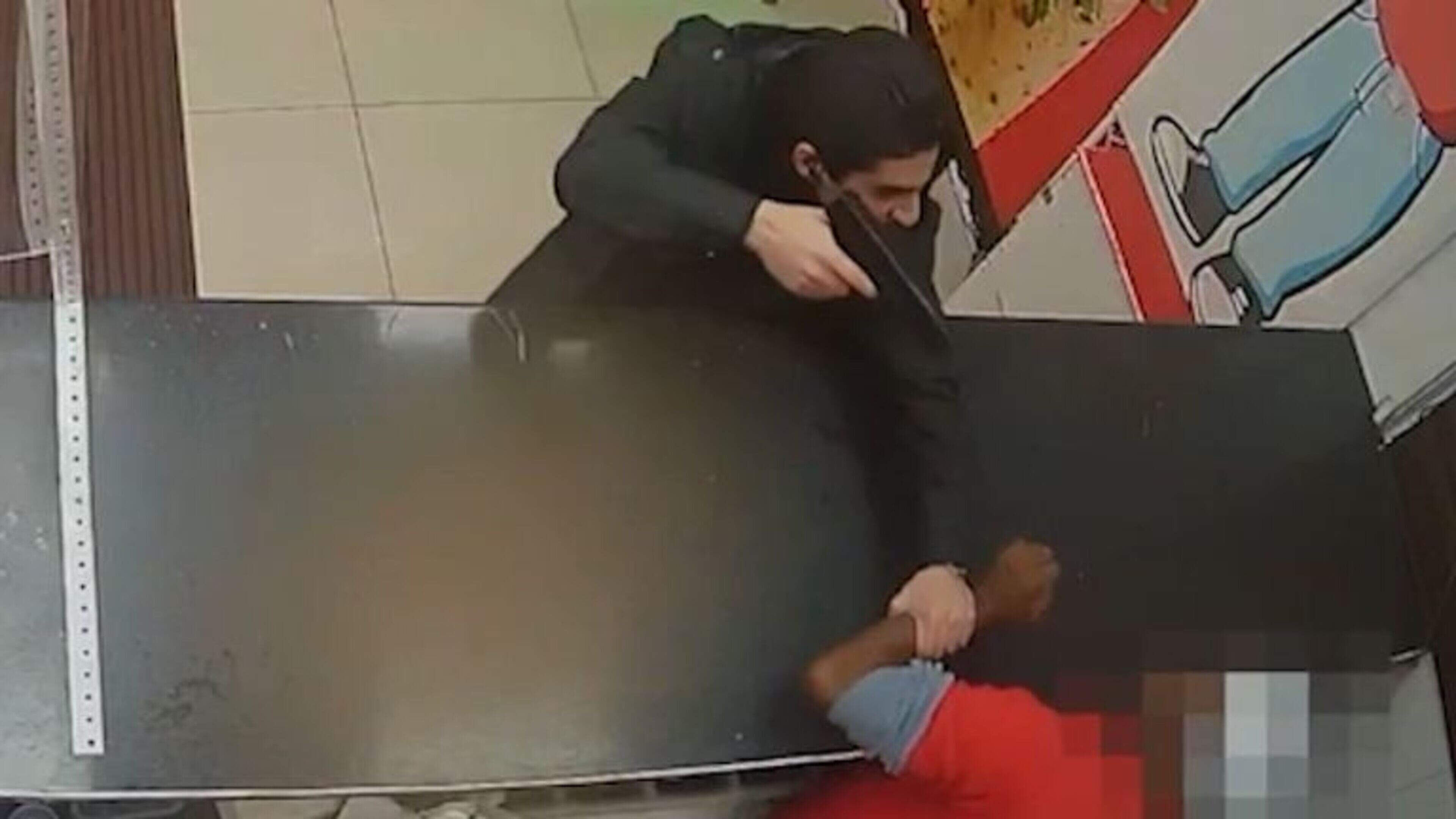 Teen caught on camera threatening to shoot chicken shop worker in row over garlic sauce