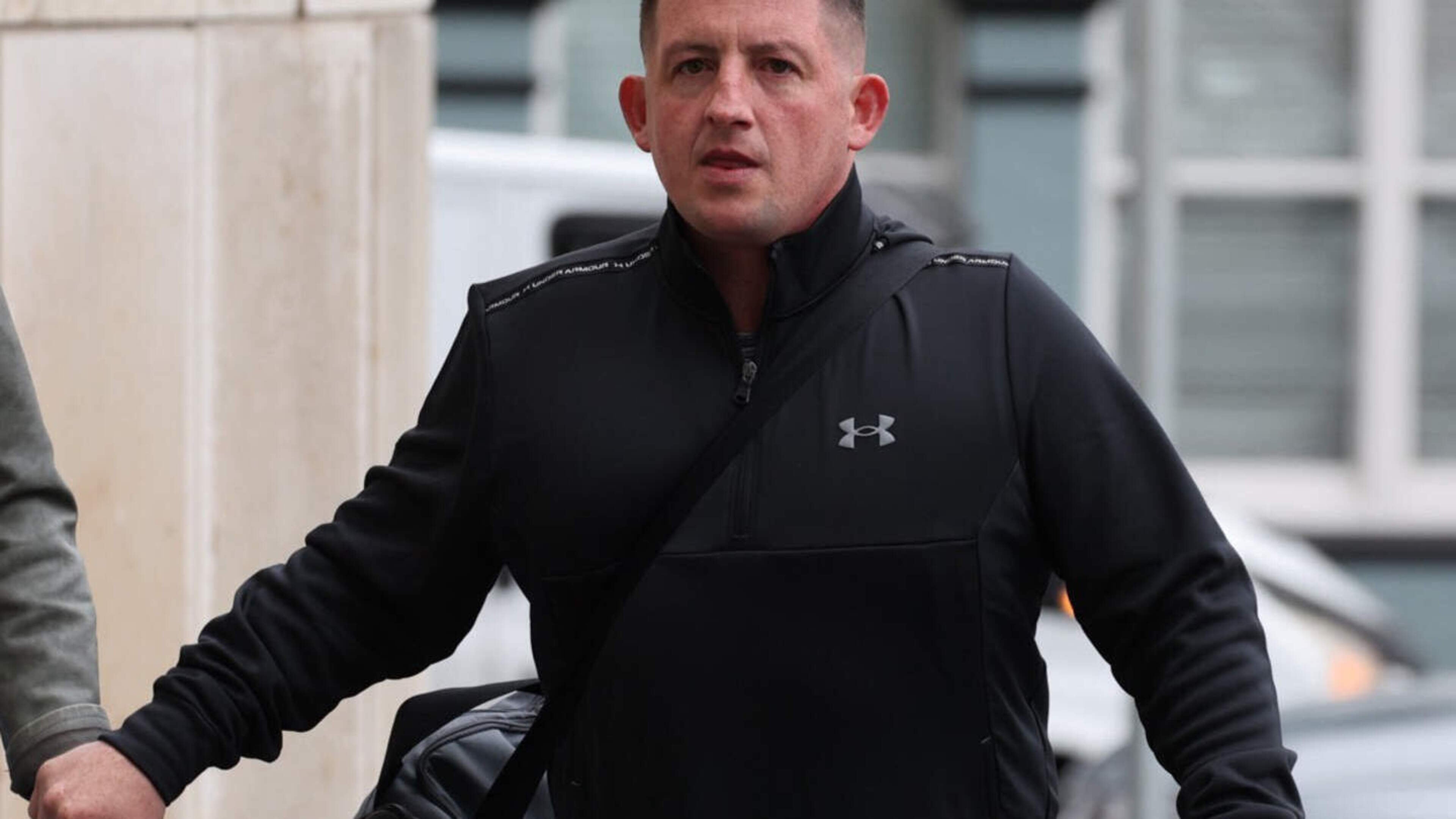 Gangster jailed for conspiracy to murder innocent mechanic threatens victim in court