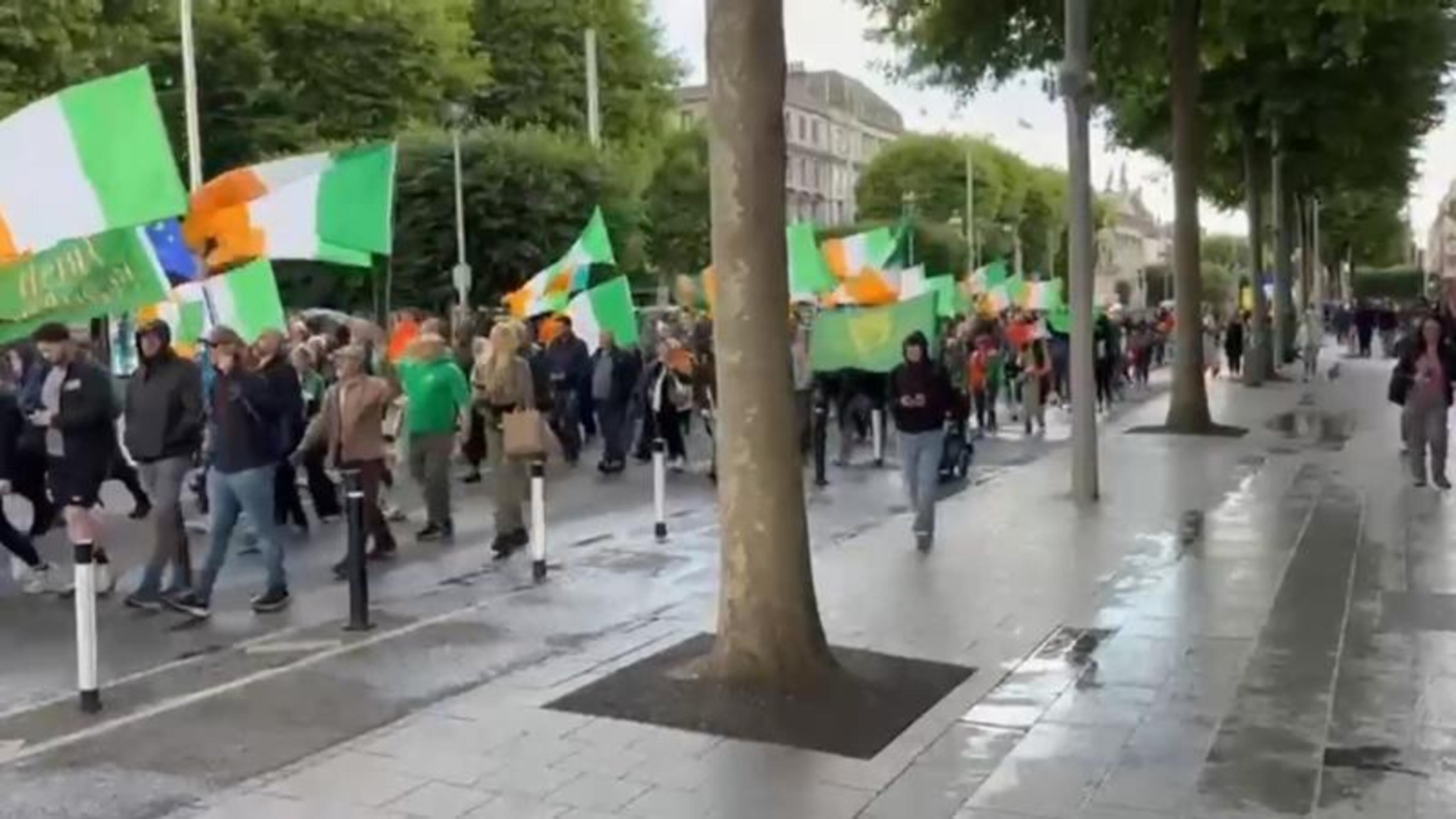 Gardaí block Dublin anti-immigration protesters from reaching Leinster house in response to Belfast attack