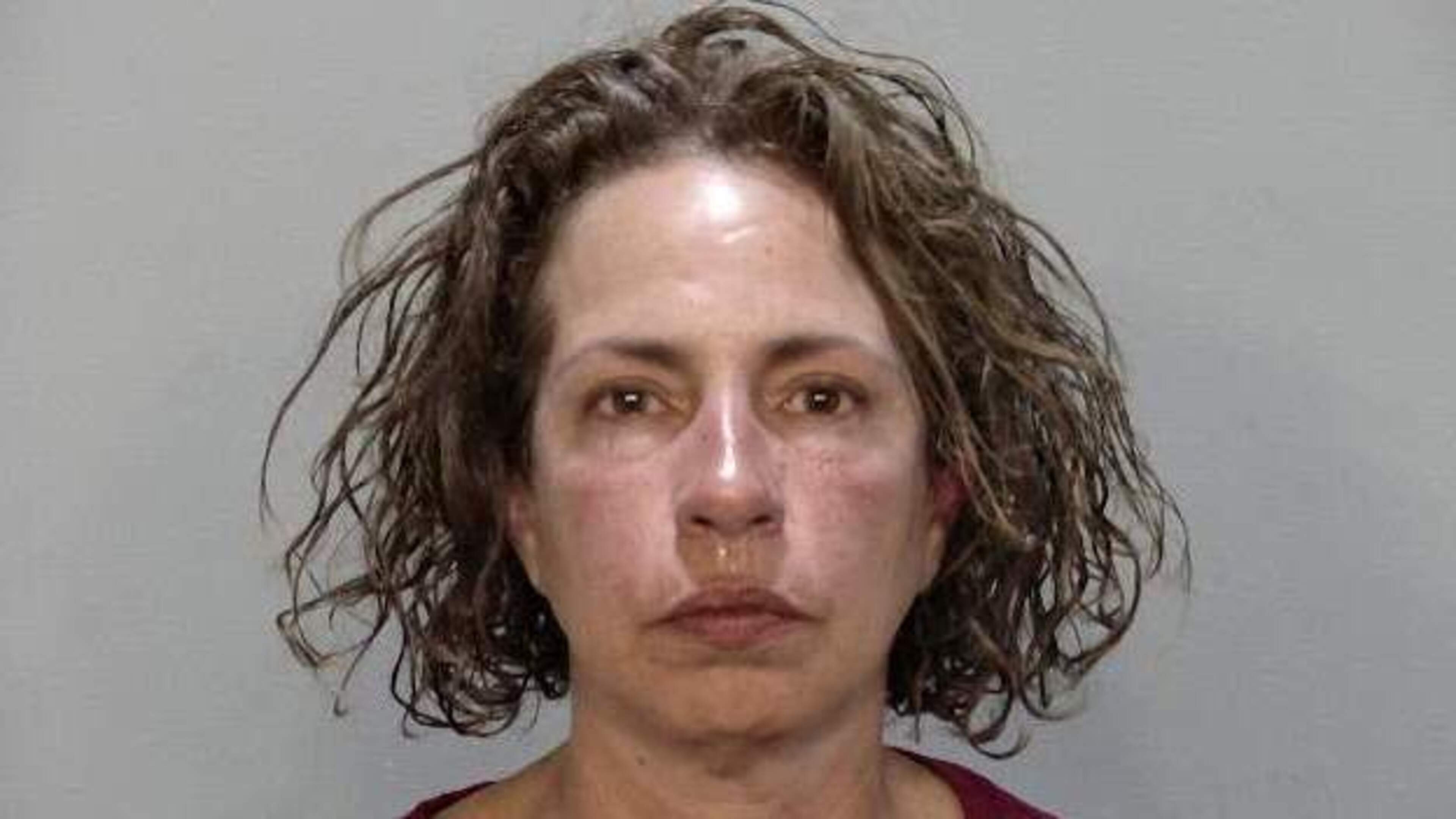 Woman arrested after high-speed chase threatened to kill cop while kicking and racially abusing others