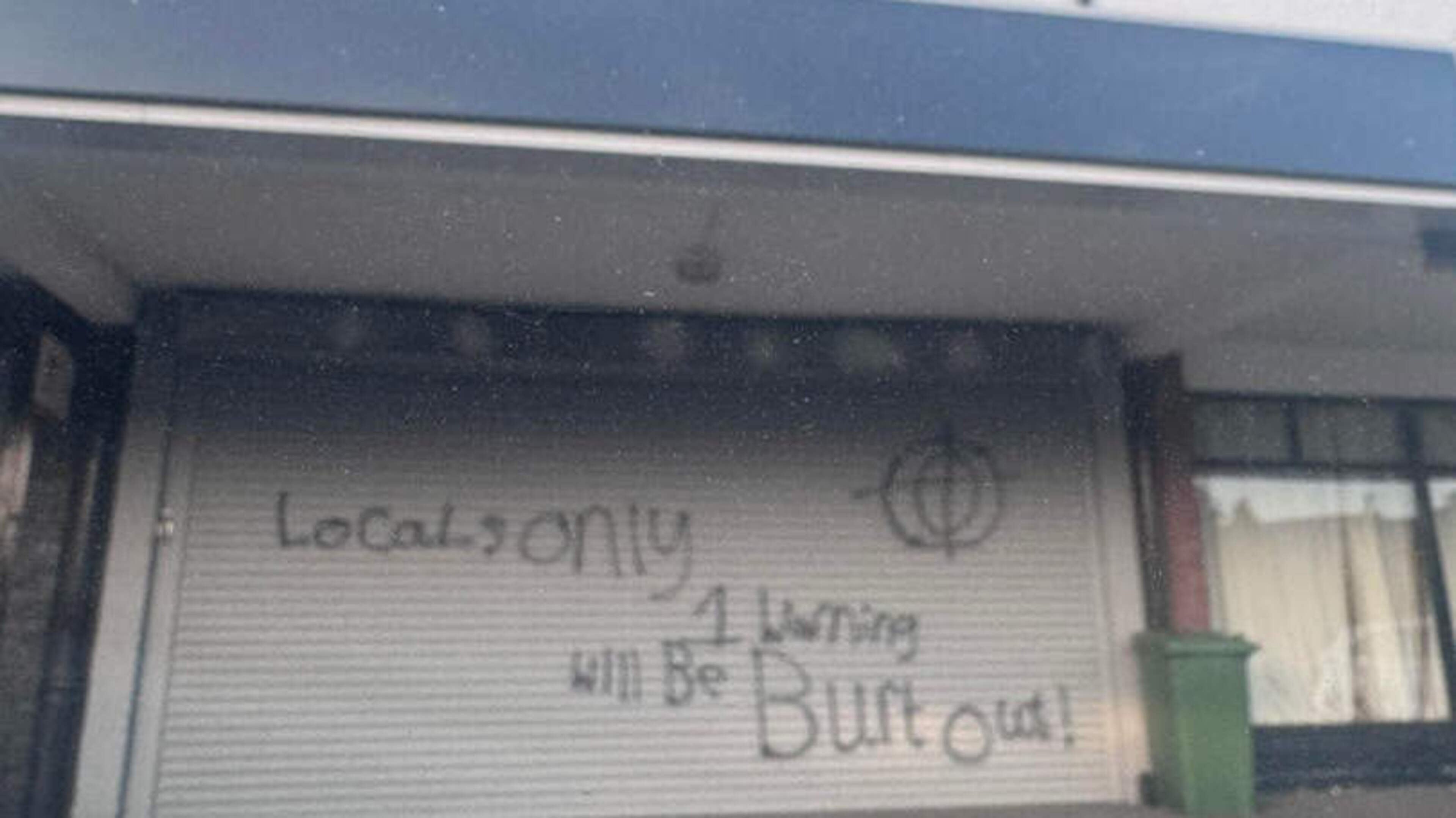 ‘Hate-filled’ graffiti condemned as cops probe racially motivated attack on shop front