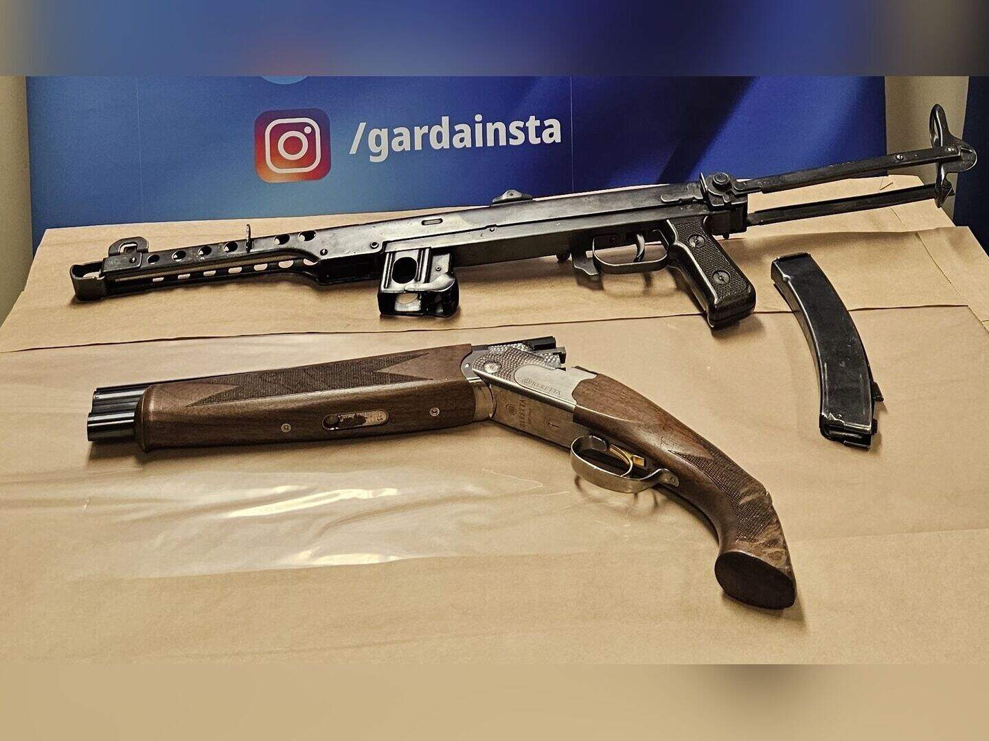 Man and woman arrested after pistol, shotgun and submachine gun seized ...