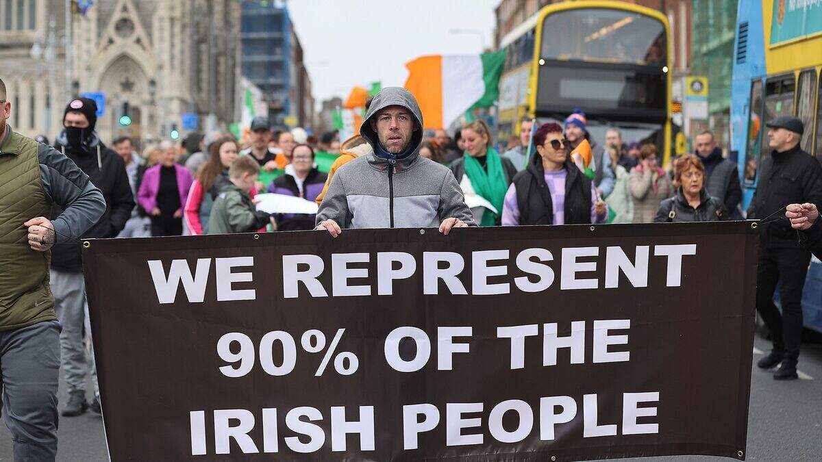 Hundreds march through Dublin city centre in protest against asylum ...